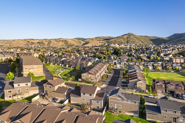 5194 Hedgerose Dr, Herriman, UT 84096 - aerial view of property's location featuring nearby suburban area and a mountainous background