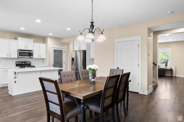 5194 Hedgerose Dr, Herriman, UT 84096 - dining room featuring a chandelier, dark wood finished floors, and recessed lighting