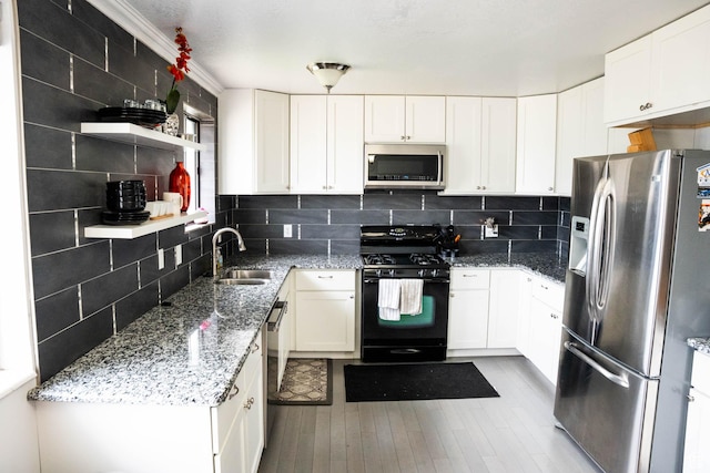 729 W 2300 N, Harrisville, UT 84414 - kitchen with appliances with stainless steel finishes, white cabinets, and decorative backsplash