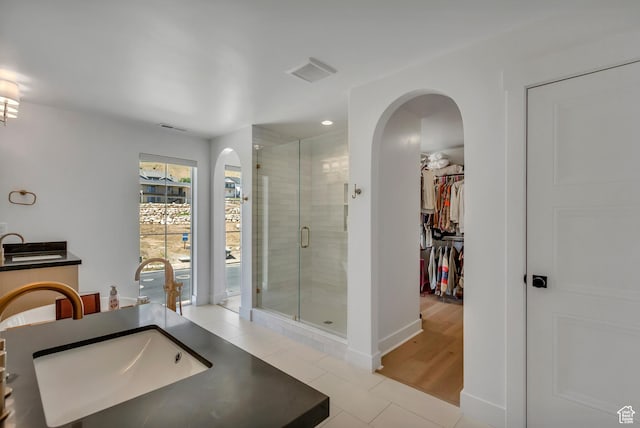 481 E 3675 N, North Ogden, UT 84414 - full bathroom with a shower stall, tile patterned flooring, a spacious closet, a bath, and recessed lighting