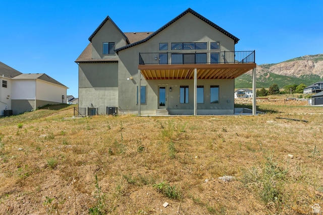 481 E 3675 N, North Ogden, UT 84414 - rear view of house featuring a mountain view, stucco siding, and a balcony