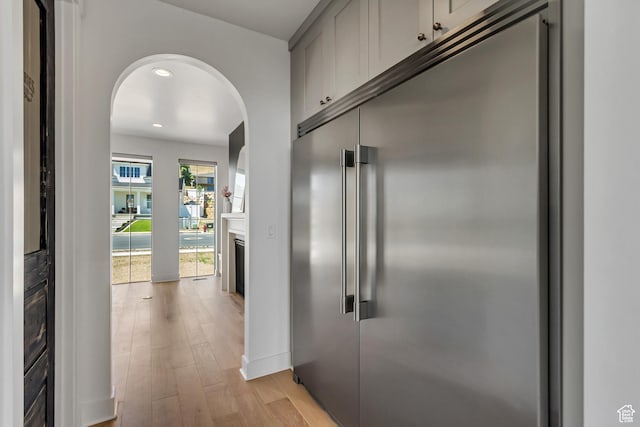 481 E 3675 N, North Ogden, UT 84414 - hallway featuring arched walkways, light wood-style floors, and recessed lighting
