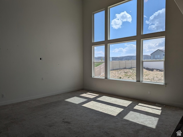 57 N Midland Dr, Saratoga Springs, UT 84045 - spare room featuring carpet floors and baseboards