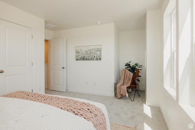 247 E 1825 N Unit 12, North Ogden, UT 84414 - bedroom featuring light colored carpet and baseboards