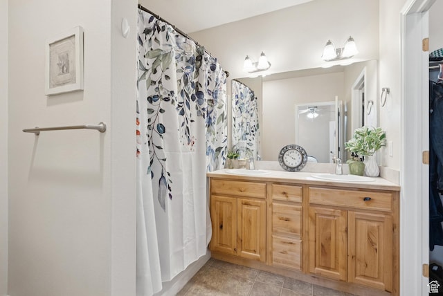 1676 E 1080 S, Provo, UT 84604 - bathroom with double vanity, tile patterned floors, a ceiling fan, and a shower with shower curtain