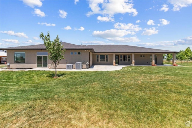1145 W 500 N, Manti, UT 84642 - rear view of house featuring stucco siding, a patio area, and a yard