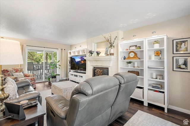 5203 Chambers St, South Ogden, UT 84403 - living area with dark wood finished floors and a fireplace