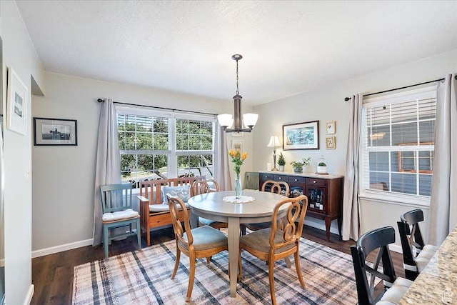 5203 Chambers St, South Ogden, UT 84403 - dining room featuring a chandelier, wood finished floors, and a textured ceiling