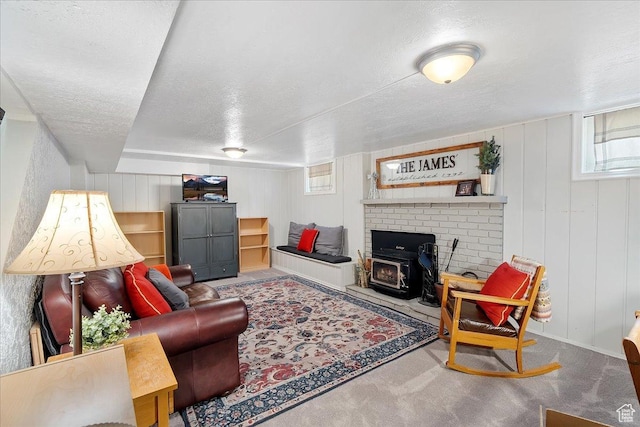 5203 Chambers St, South Ogden, UT 84403 - carpeted living area with a wood stove and a textured ceiling