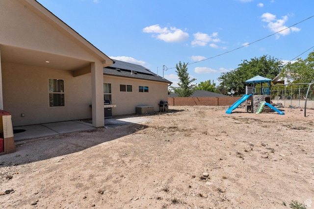 586 N 360 W, La Verkin, UT 84745 - fenced backyard featuring a playground