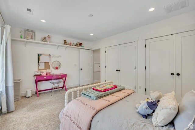 2040 E Lambourne Ave, Millcreek, UT 84109 - carpeted bedroom featuring two closets and recessed lighting