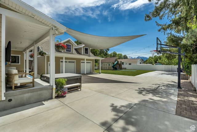 2040 E Lambourne Ave, Millcreek, UT 84109 - view of patio with a playground and driveway