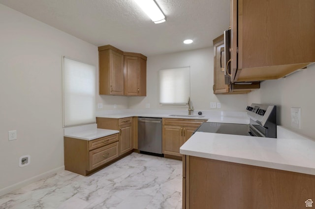 1540 23rd St, Ogden, UT 84401 - kitchen featuring dishwasher, light marble finish flooring, light countertops, electric stove, and a textured ceiling