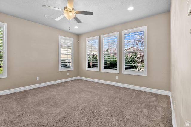 4892 W Veeroma Way S, Jordan, UT 84009 - spare room with carpet, a ceiling fan, healthy amount of natural light, recessed lighting, and a textured ceiling