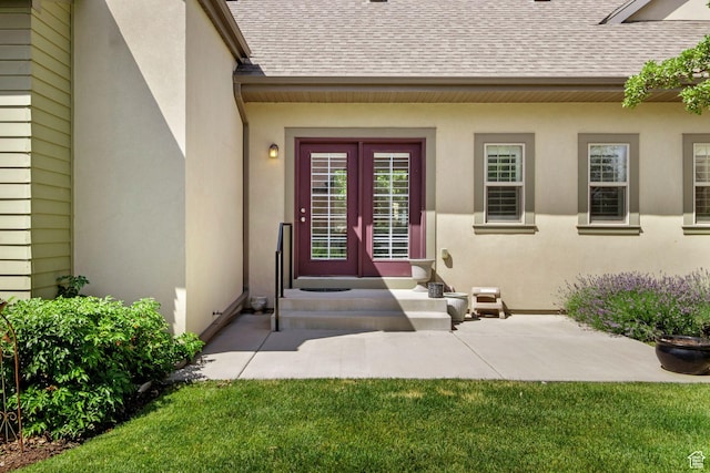 4892 W Veeroma Way S, Jordan, UT 84009 - property entrance featuring a shingled roof, french doors, and stucco siding