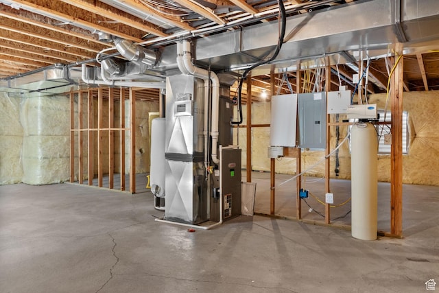 4892 W Veeroma Way S, Jordan, UT 84009 - unfinished below grade area with electric panel, heating unit, a water softener system, and water heater