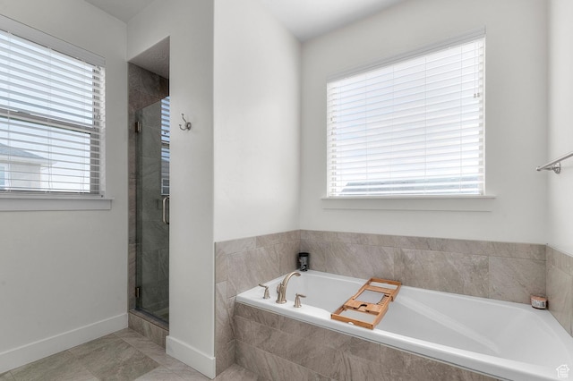 231 N 750 W, Springville, UT 84663 - full bathroom with a garden tub, plenty of natural light, a shower stall, and tile patterned flooring