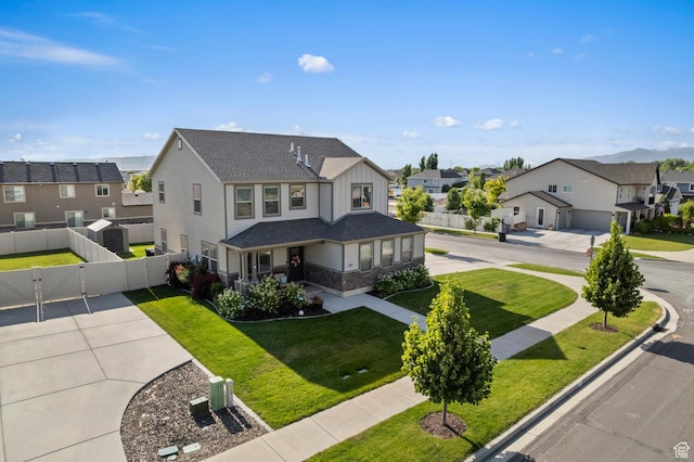 231 N 750 W, Springville, UT 84663 - view of front of property featuring a residential view, a gate, board and batten siding, and stone siding
