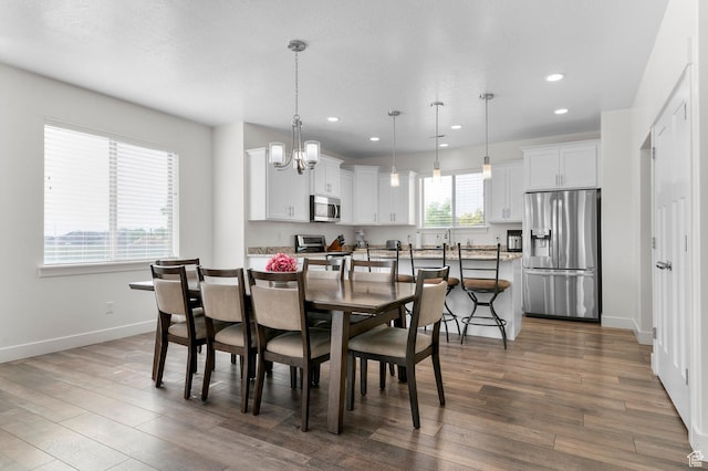 231 N 750 W, Springville, UT 84663 - dining area with dark wood-style flooring, recessed lighting, and a chandelier