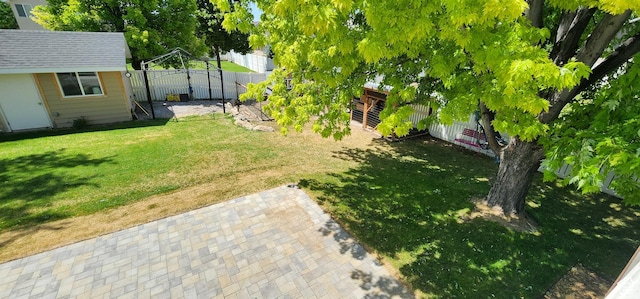 1309 W 1200 S, Woods Cross, UT 84087 - fenced backyard with an outbuilding and a patio area