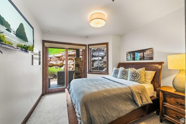 4121 Fairway Ln Unit A1, Park City, UT 84098 - carpeted bedroom featuring access to outside and baseboards
