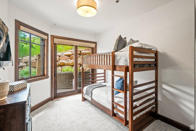 4121 Fairway Ln Unit A1, Park City, UT 84098 - bedroom with carpet floors and access to outside