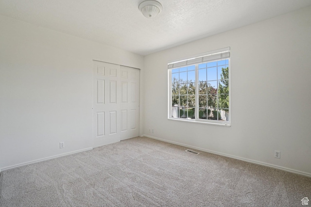 4964 Boulder Glen Cir, West Jordan, UT 84088 - unfurnished bedroom with carpet floors and a closet