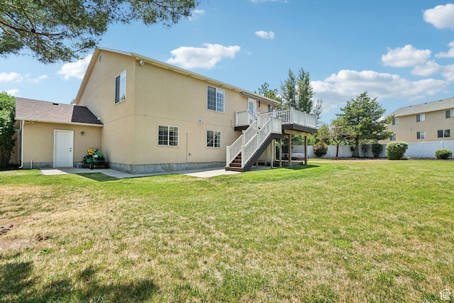 4964 Boulder Glen Cir, West Jordan, UT 84088 - back of house featuring stairs, a wooden deck, and stucco siding