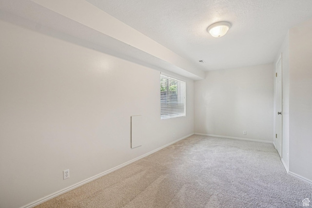 4964 Boulder Glen Cir, West Jordan, UT 84088 - empty room with light carpet and a textured ceiling