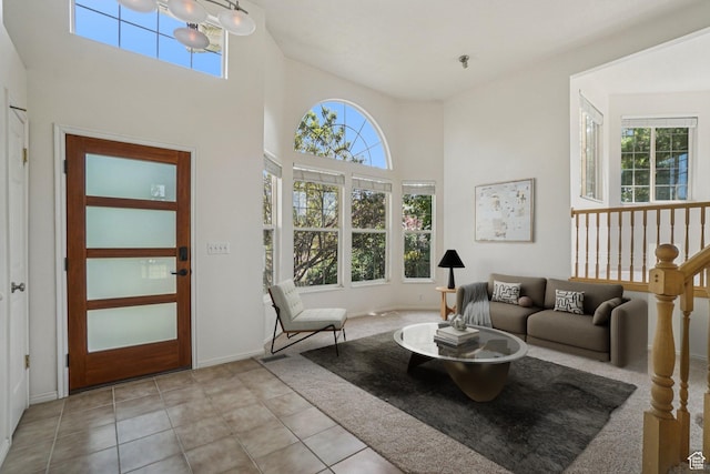 4964 Boulder Glen Cir, West Jordan, UT 84088 - tiled living room with plenty of natural light and a towering ceiling