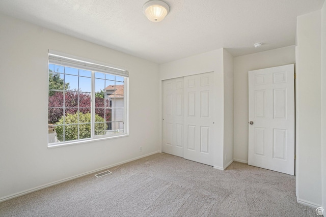 4964 Boulder Glen Cir, West Jordan, UT 84088 - unfurnished bedroom with carpet floors and a closet