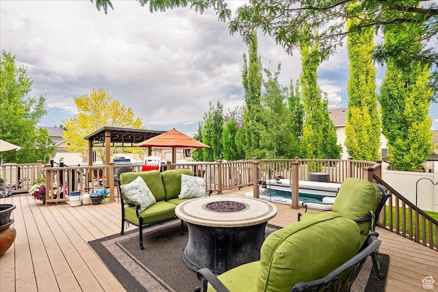 12937 S Old Country Ct W, Riverton, UT 84065 - wooden terrace featuring an outdoor living space with a fire pit