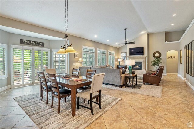 12937 S Old Country Ct W, Riverton, UT 84065 - dining area with healthy amount of natural light, a ceiling fan, recessed lighting, light tile patterned floors, and arched walkways