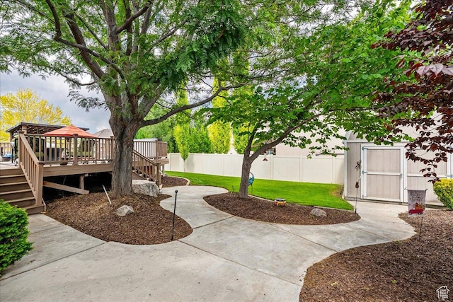12937 S Old Country Ct W, Riverton, UT 84065 - fenced backyard with a wooden deck and stairway