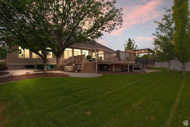 12937 S Old Country Ct W, Riverton, UT 84065 - back of property featuring a yard, a wooden deck, and stairway