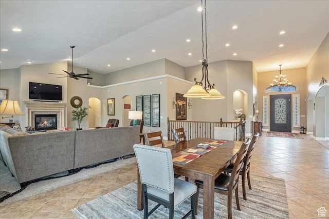12937 S Old Country Ct W, Riverton, UT 84065 - dining room featuring arched walkways, light tile patterned floors, high vaulted ceiling, a ceiling fan, and recessed lighting