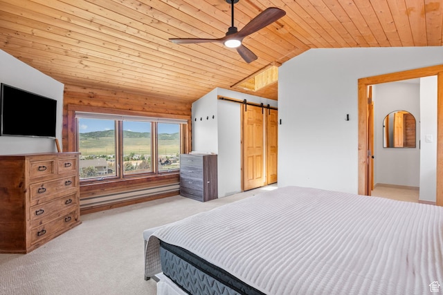 6385 Mountain View Dr, Park City, UT 84098 - bedroom featuring vaulted ceiling, wood ceiling, carpet, a barn door, and ceiling fan