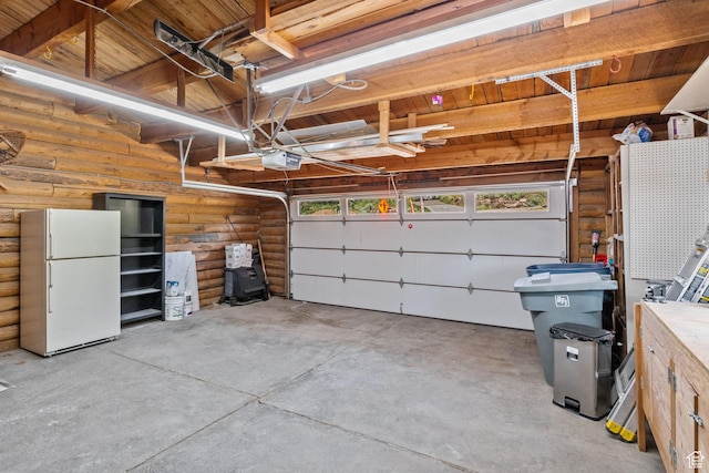 6385 Mountain View Dr, Park City, UT 84098 - garage featuring freestanding refrigerator and a garage door opener