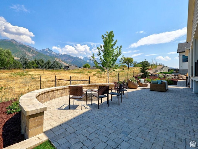 7817 S Danish Pine Ln Unit 101, Cottonwood Heights, UT 84121 - view of patio / terrace with a mountain view, outdoor lounge area, and a view of rural / pastoral area