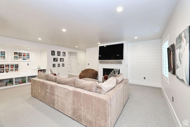 7817 S Danish Pine Ln Unit 101, Cottonwood Heights, UT 84121 - living area featuring light colored carpet, a fireplace, and recessed lighting