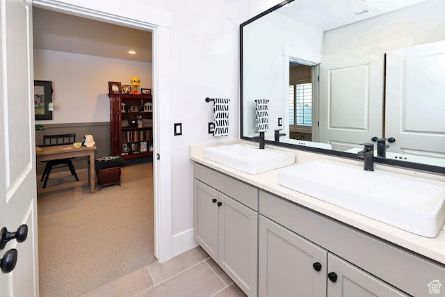 7817 S Danish Pine Ln Unit 101, Cottonwood Heights, UT 84121 - bathroom featuring double vanity, tile patterned flooring, and recessed lighting