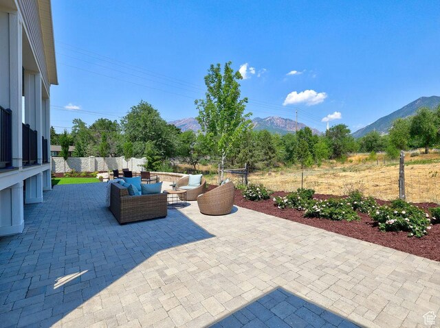 7817 S Danish Pine Ln Unit 101, Cottonwood Heights, UT 84121 - view of patio / terrace featuring a mountain view and an outdoor living space