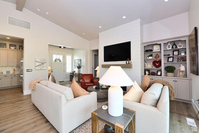 7817 S Danish Pine Ln Unit 101, Cottonwood Heights, UT 84121 - living area with light wood finished floors, recessed lighting, high vaulted ceiling, and beamed ceiling