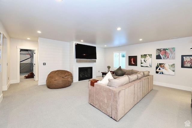 7817 S Danish Pine Ln Unit 101, Cottonwood Heights, UT 84121 - living room featuring light colored carpet, recessed lighting, and a large fireplace