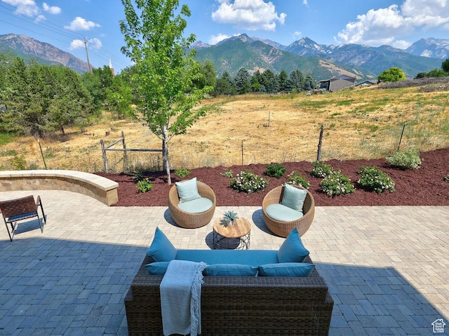 7817 S Danish Pine Ln Unit 101, Cottonwood Heights, UT 84121 - view of patio / terrace featuring a mountain view and an outdoor hangout area