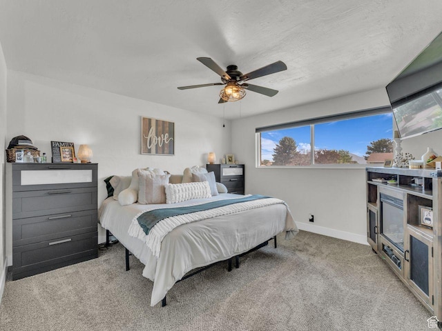 4332 W Losee Dr, West Valley City, UT 84120 - carpeted bedroom with baseboards and ceiling fan