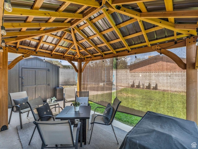 4332 W Losee Dr, West Valley City, UT 84120 - fenced backyard featuring a shed, a gazebo, and a patio