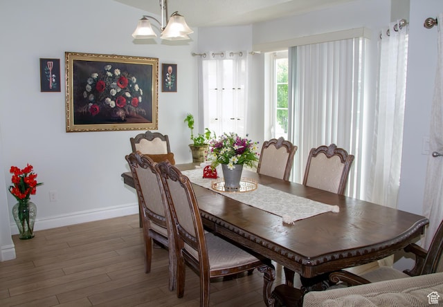 1415 N 3300 W, Provo, UT 84601 - dining room featuring wood finished floors and a chandelier