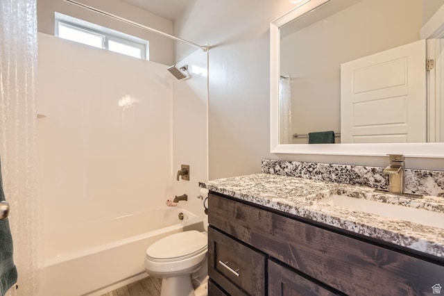 4909 N Cliffrose Dr, Eagle Mountain, UT 84005 - bathroom with shower / washtub combination, vanity, and wood finished floors