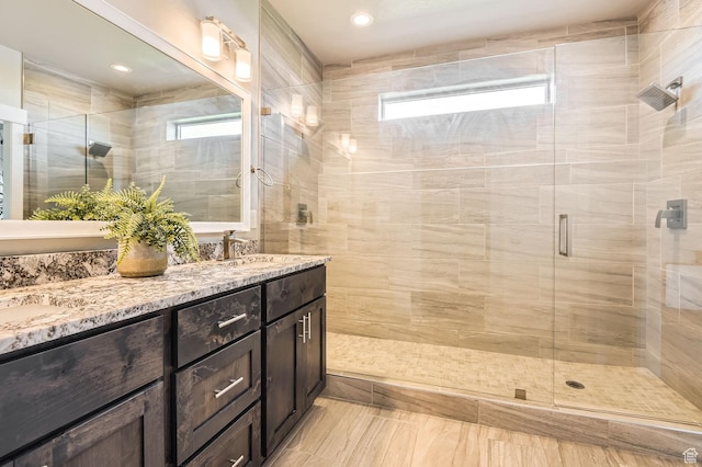 4909 N Cliffrose Dr, Eagle Mountain, UT 84005 - full bathroom featuring double vanity and a shower stall